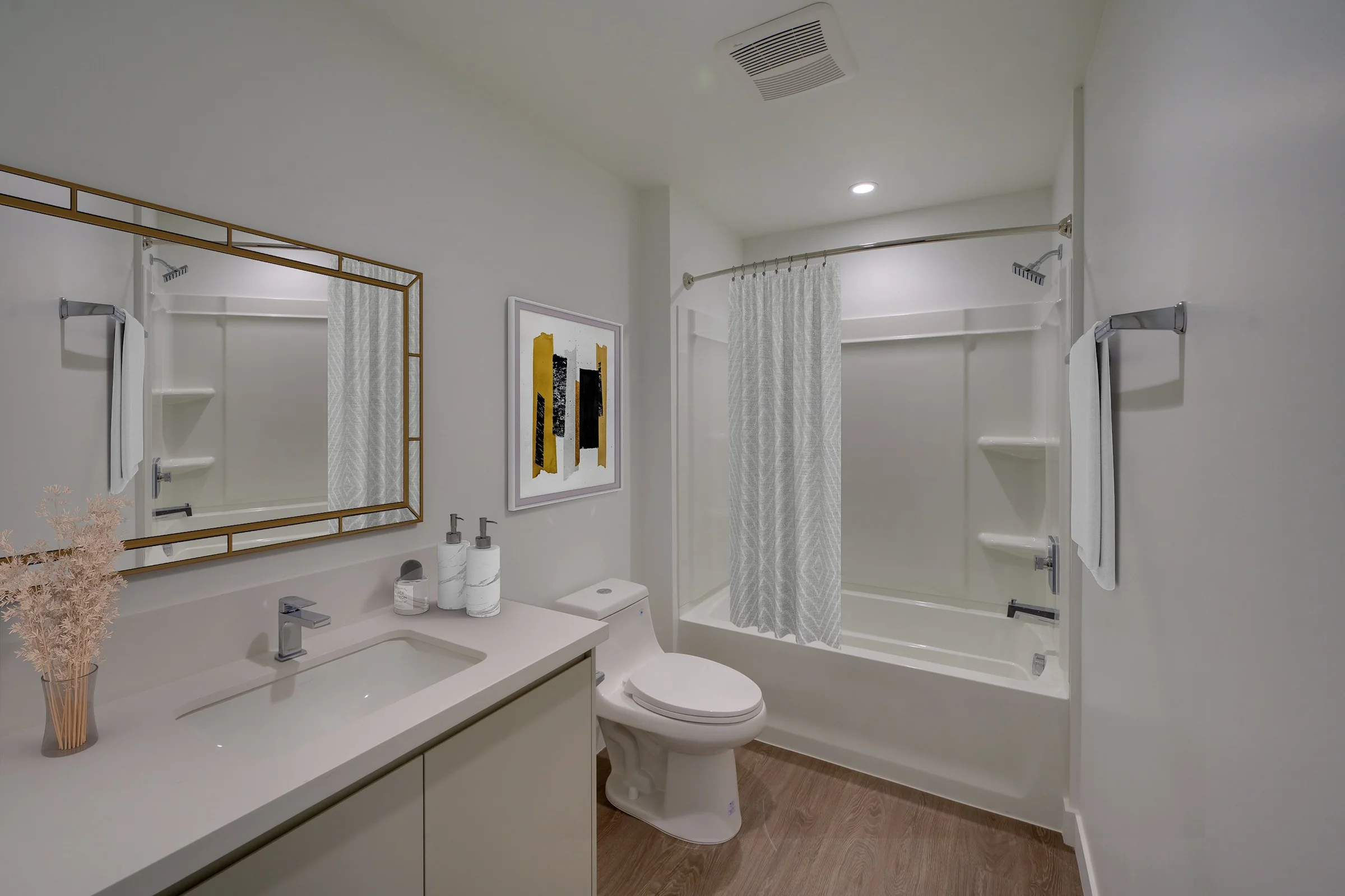 Pine on Gramercy bathroom with tub and contemporary vanity