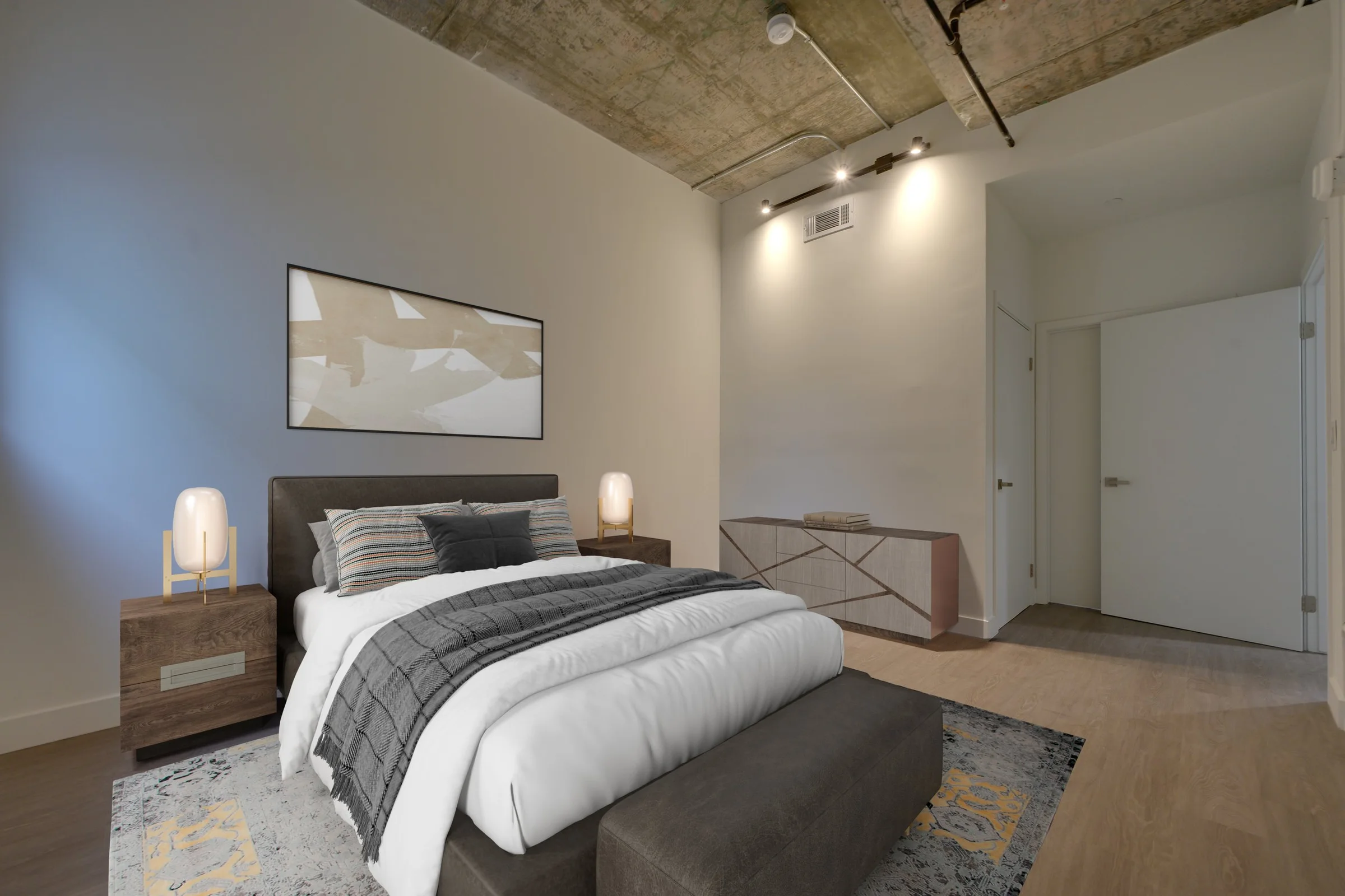 Pine on Gramercy bedroom with exposed concrete ceiling