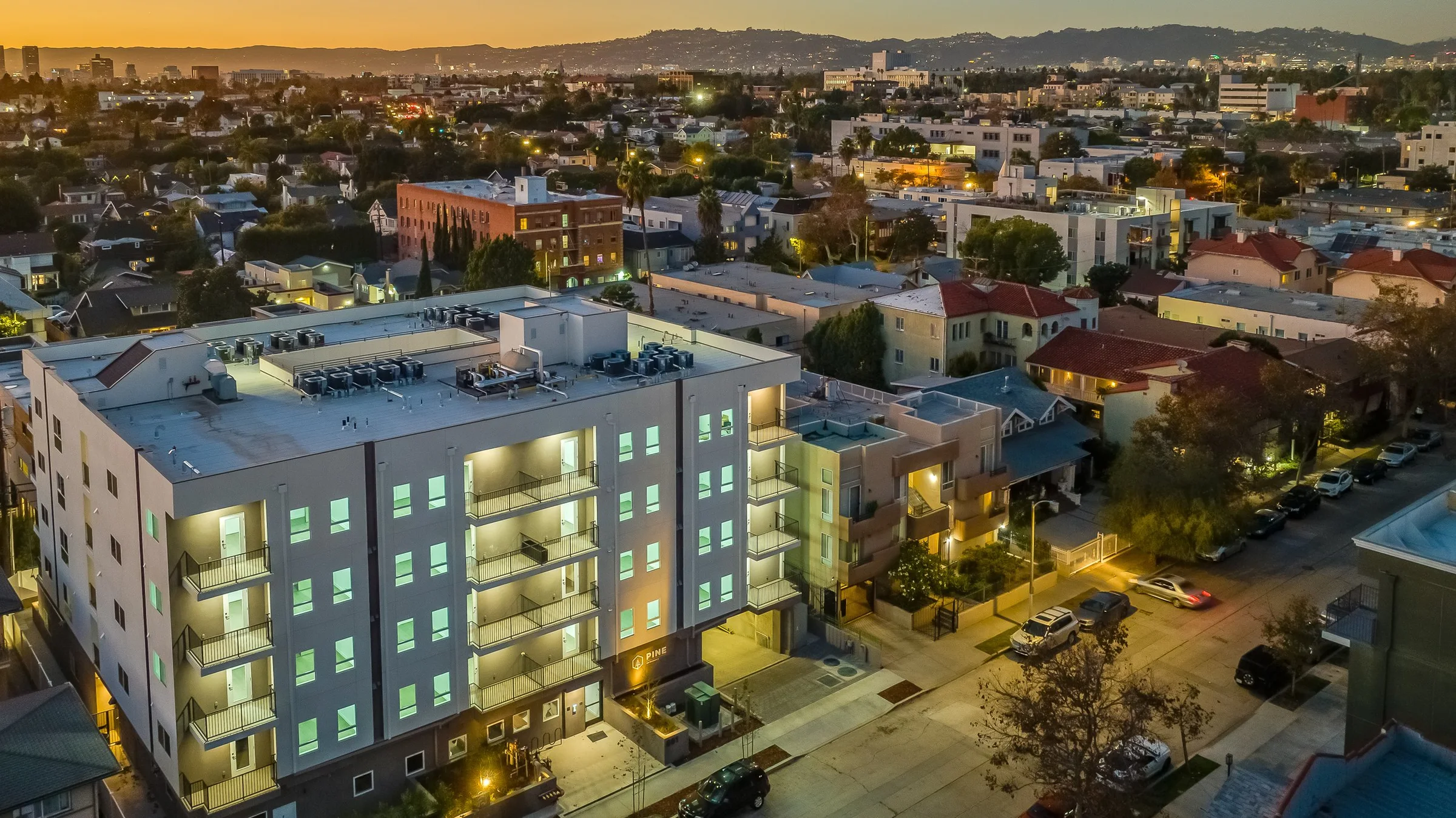 Pine on Gramercy illuminated at dusk in central Los Angeles